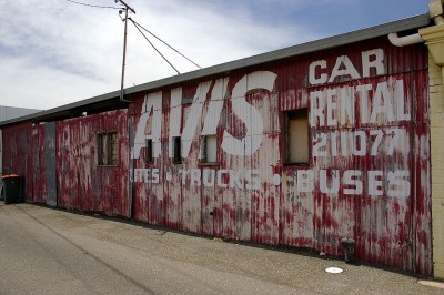 1024px-Old_AVIS_Car_Rental_advert